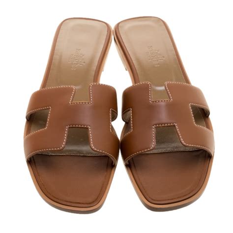 hermes style flat sandals.